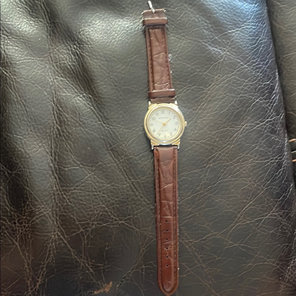 Elegant Brown and Gold Leather Bags with Vintage Texture